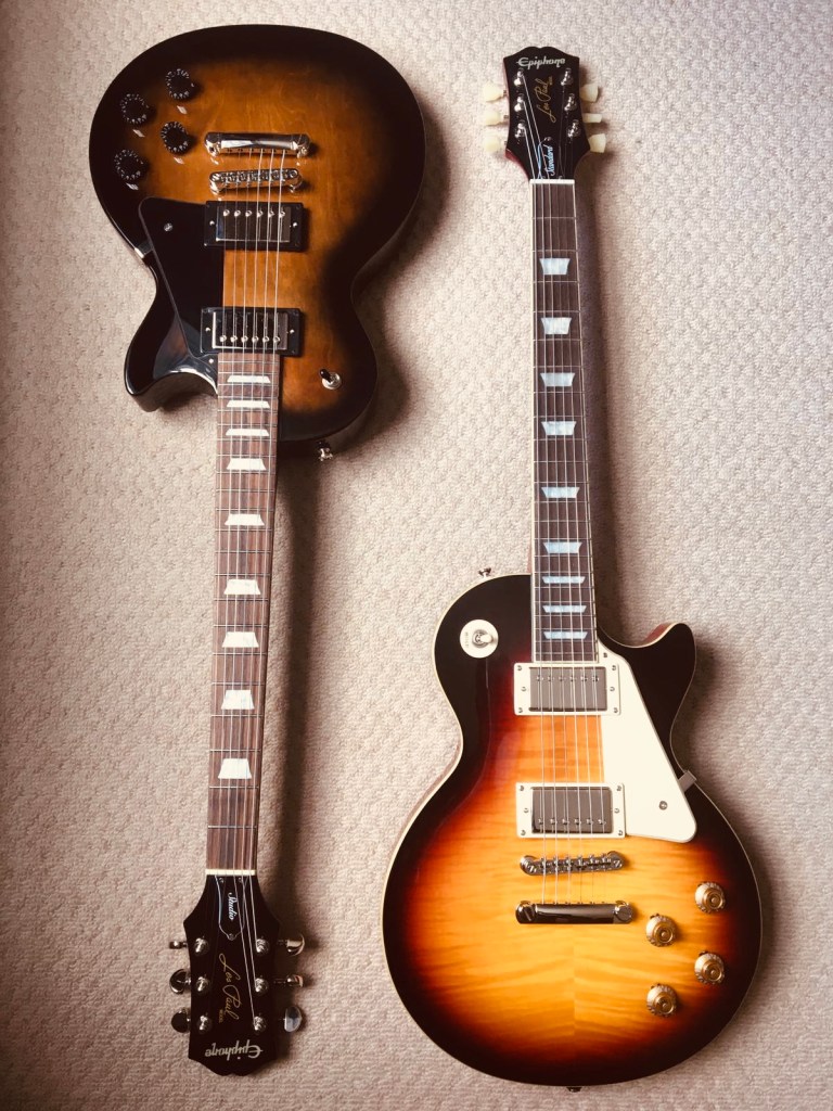 two-guitars-les-paul-record-weekly